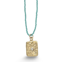 VIV NECKLACE IN GOLD ON TURQUOISE BEADS
