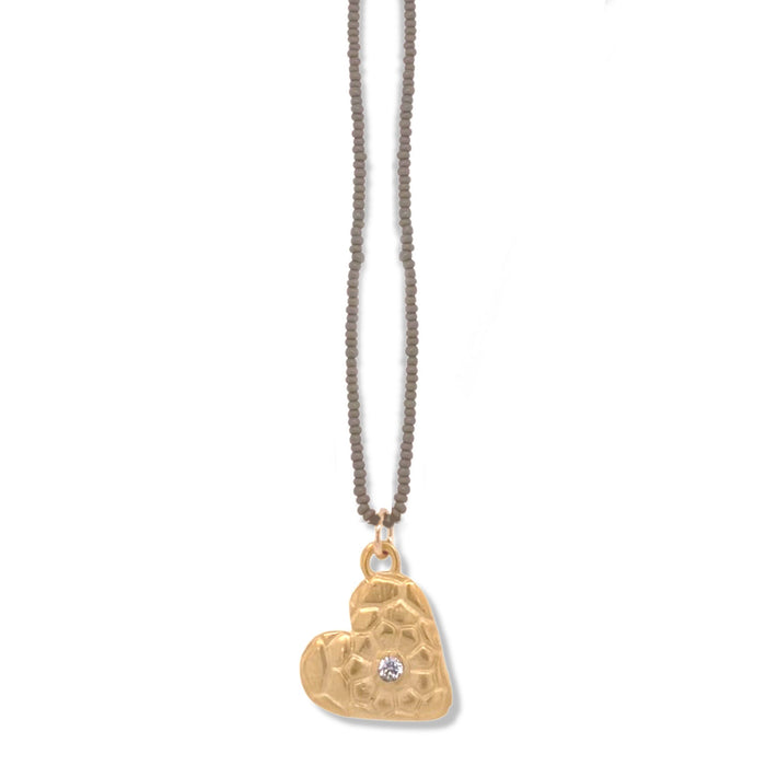 FEZ NECKLACE IN GOLD ON CHARCOAL BEADS