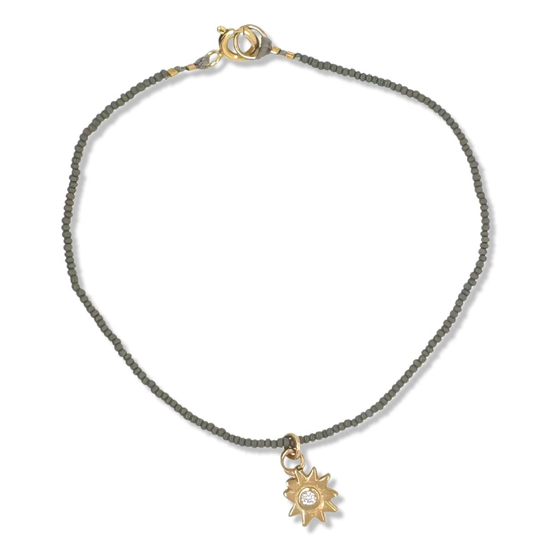 Minin Star Charm Bracelet on Charcoal Beads By Keely Smith Jewelry Designs
