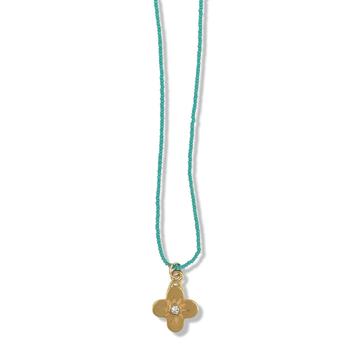 TIA NECKLACE IN GOLD ON TURQUOISE BEADS