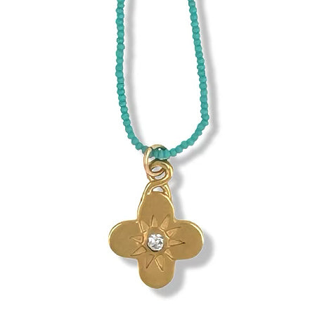 TIA NECKLACE IN GOLD ON TURQUOISE BEADS